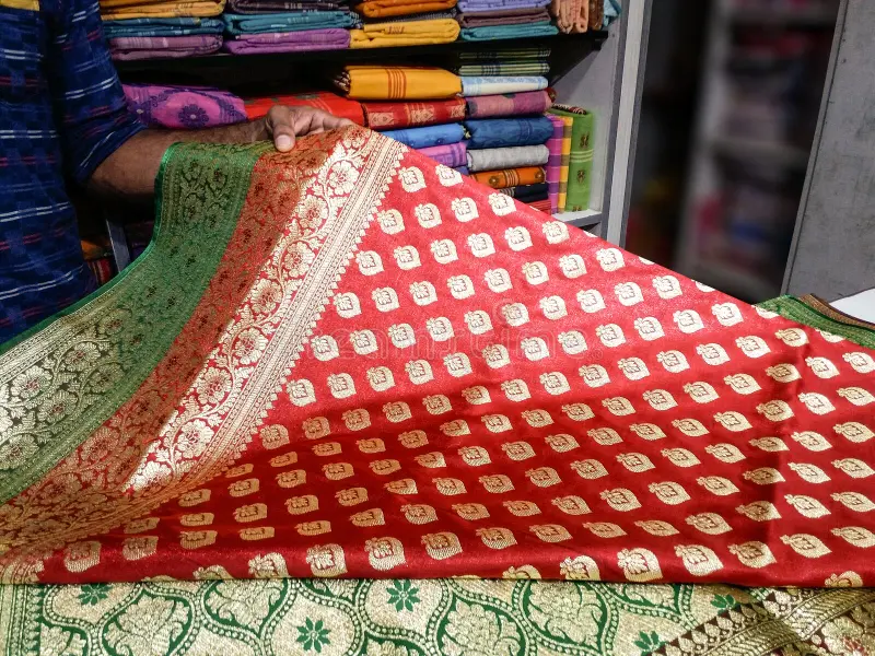 Mysore Silk Saree Price Guide 2026: Latest Rates & Buying Tips Seller showing mysore silk saree prices to customers